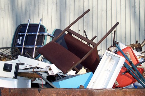 Professional team assessing a loft space for clearance in Hillingdon