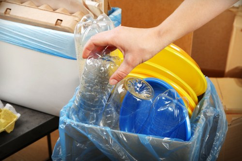 Customer consulting with waste clearance service provider
